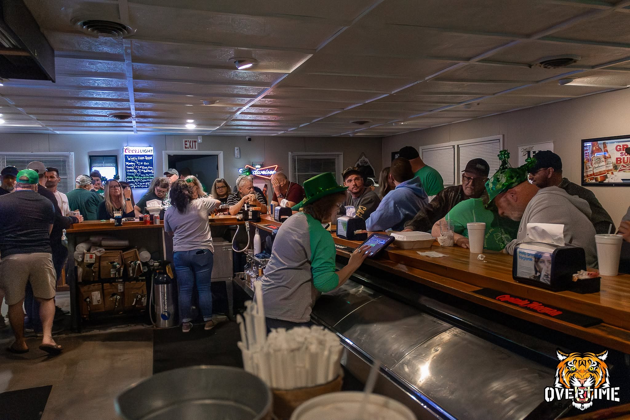 A busy event inside Overtime Bar & Grill